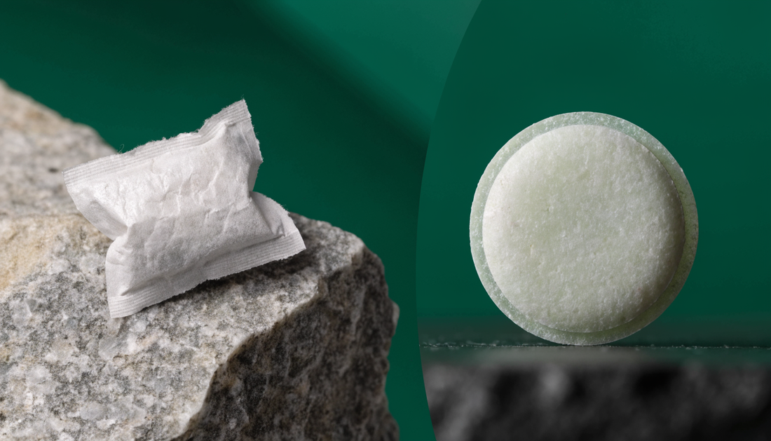 A caffeine pouch and a mint side by side in a comparison still life
