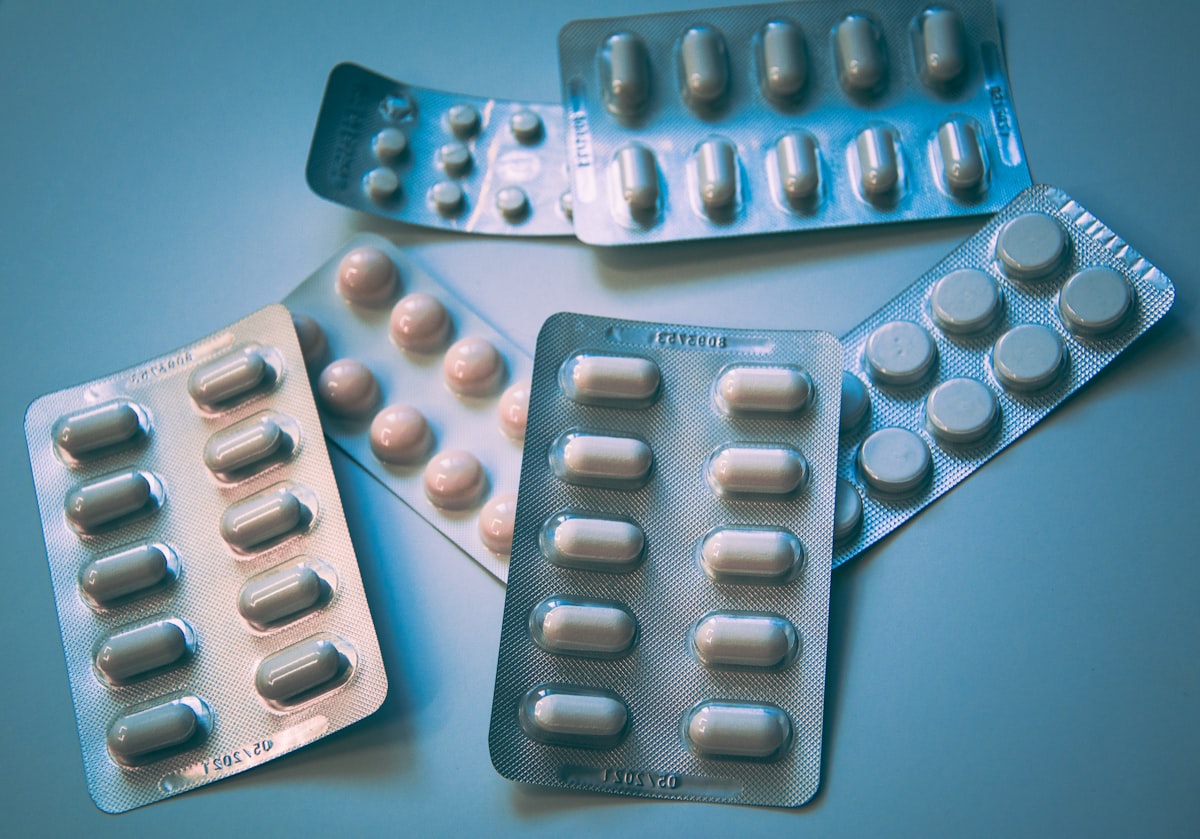 Prescription pill bottles on a white surface