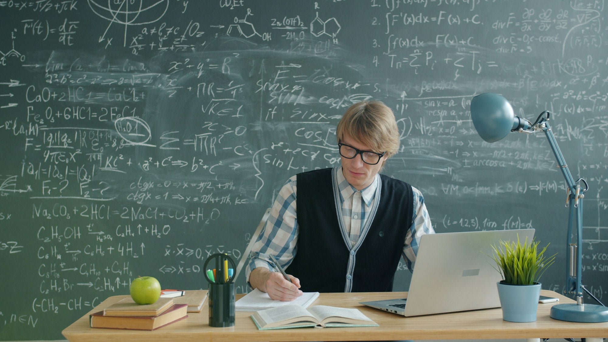 Person focused at a desk — OffScript concentration formula